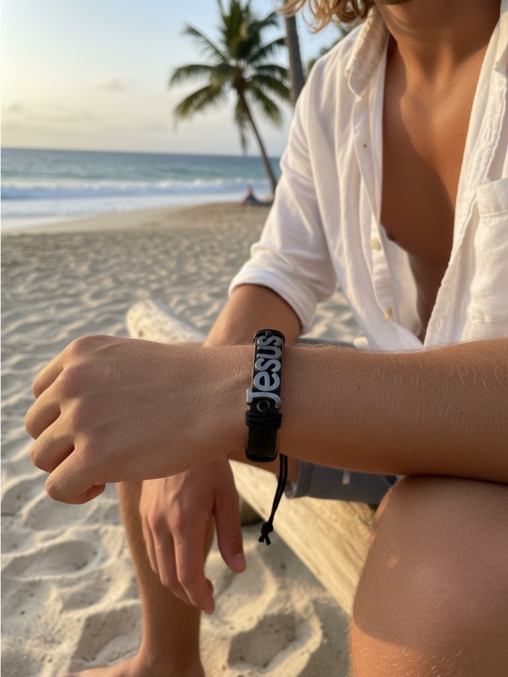 Black Leather Bracelet with 'Jesus' Silver Lettering